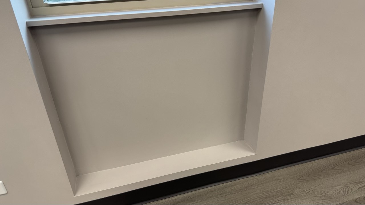 Finished wall area under window in a remodeled meeting room in Rockdale IL