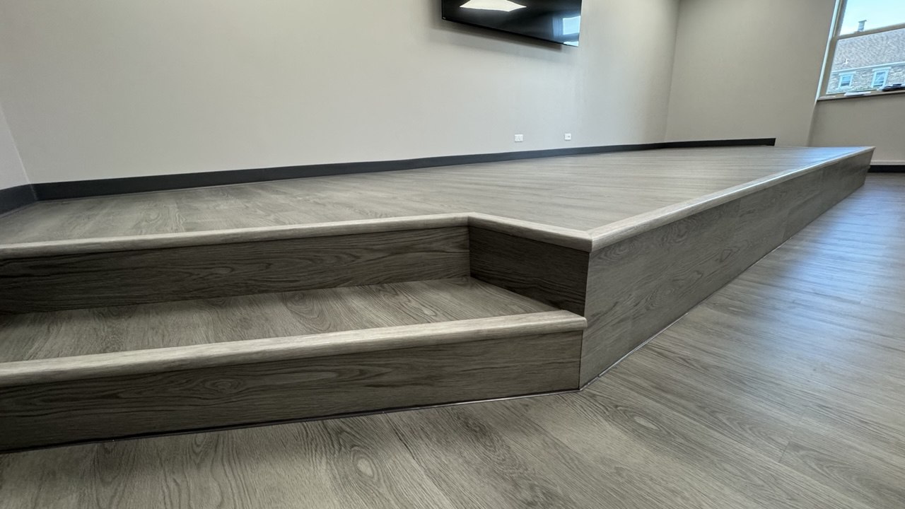 Custom podium and finished steps in a meeting room in Rockdale IL