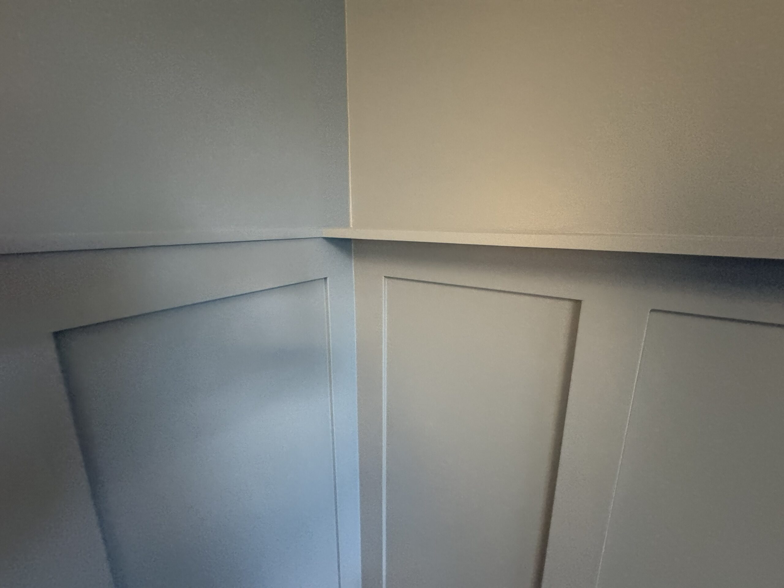 Board and batten accent wall in bedroom in Clarendon Hills IL