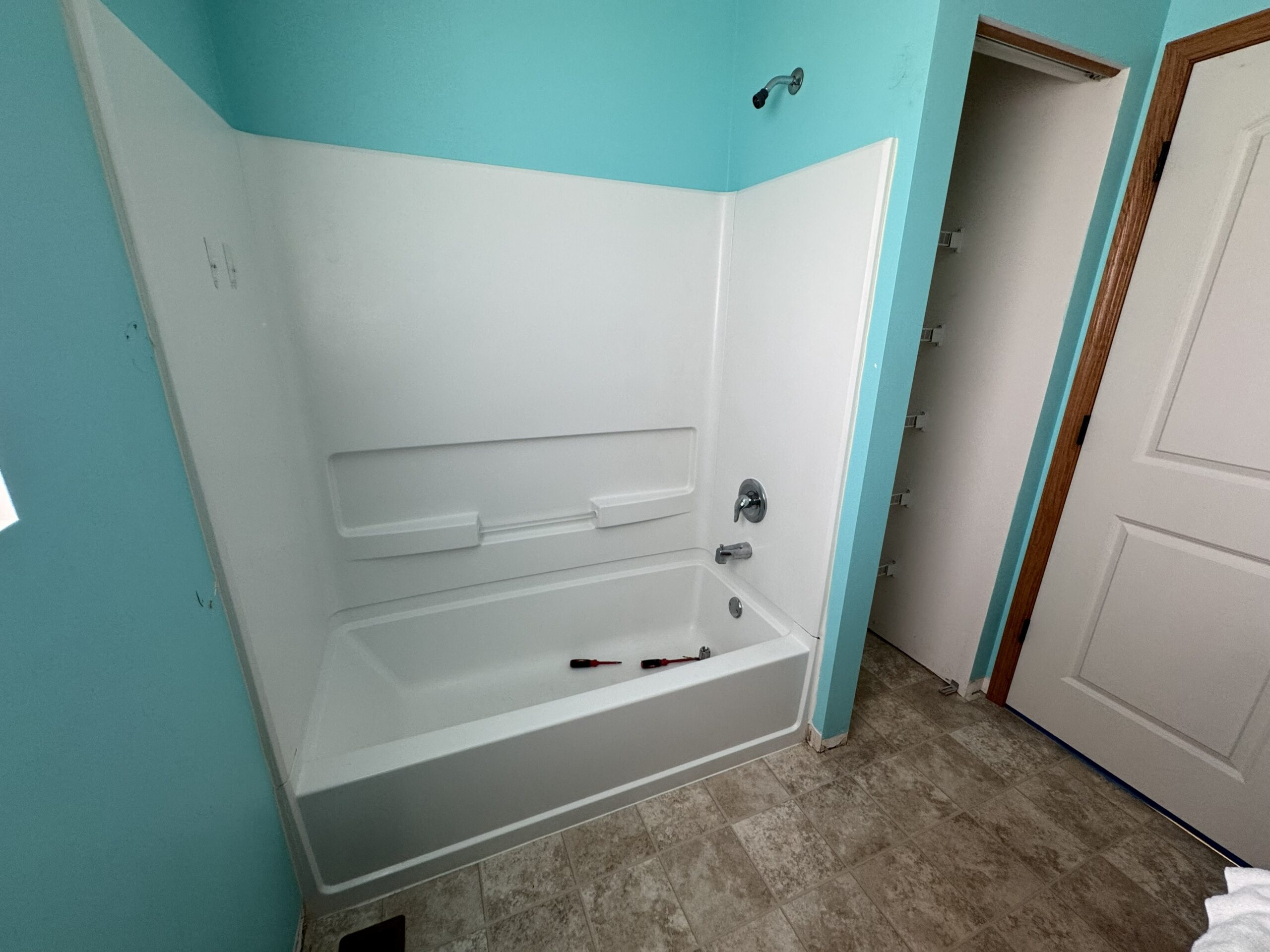 Bathroom before update and bathtub replacement in Yorkville IL