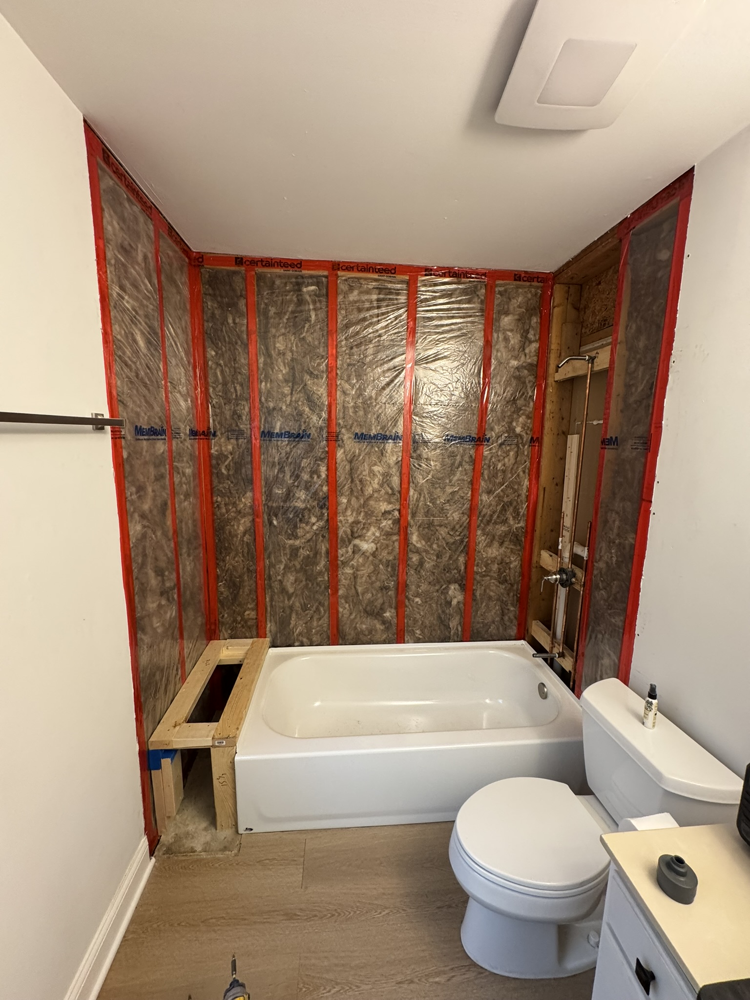 Insulation and vapor protection installed around bathtub in Aurora IL