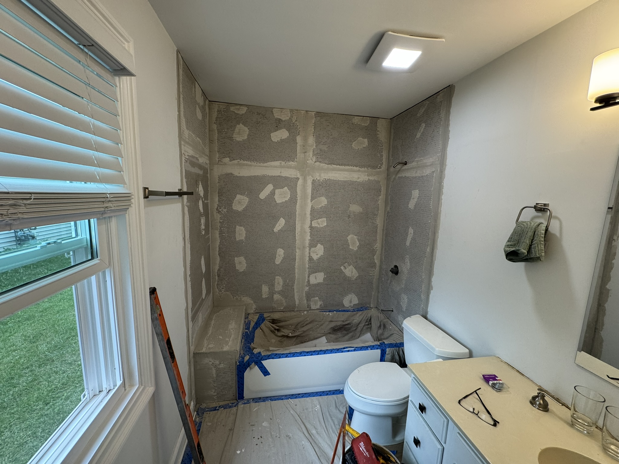 Cement board installed around bathtub and platform in Aurora IL